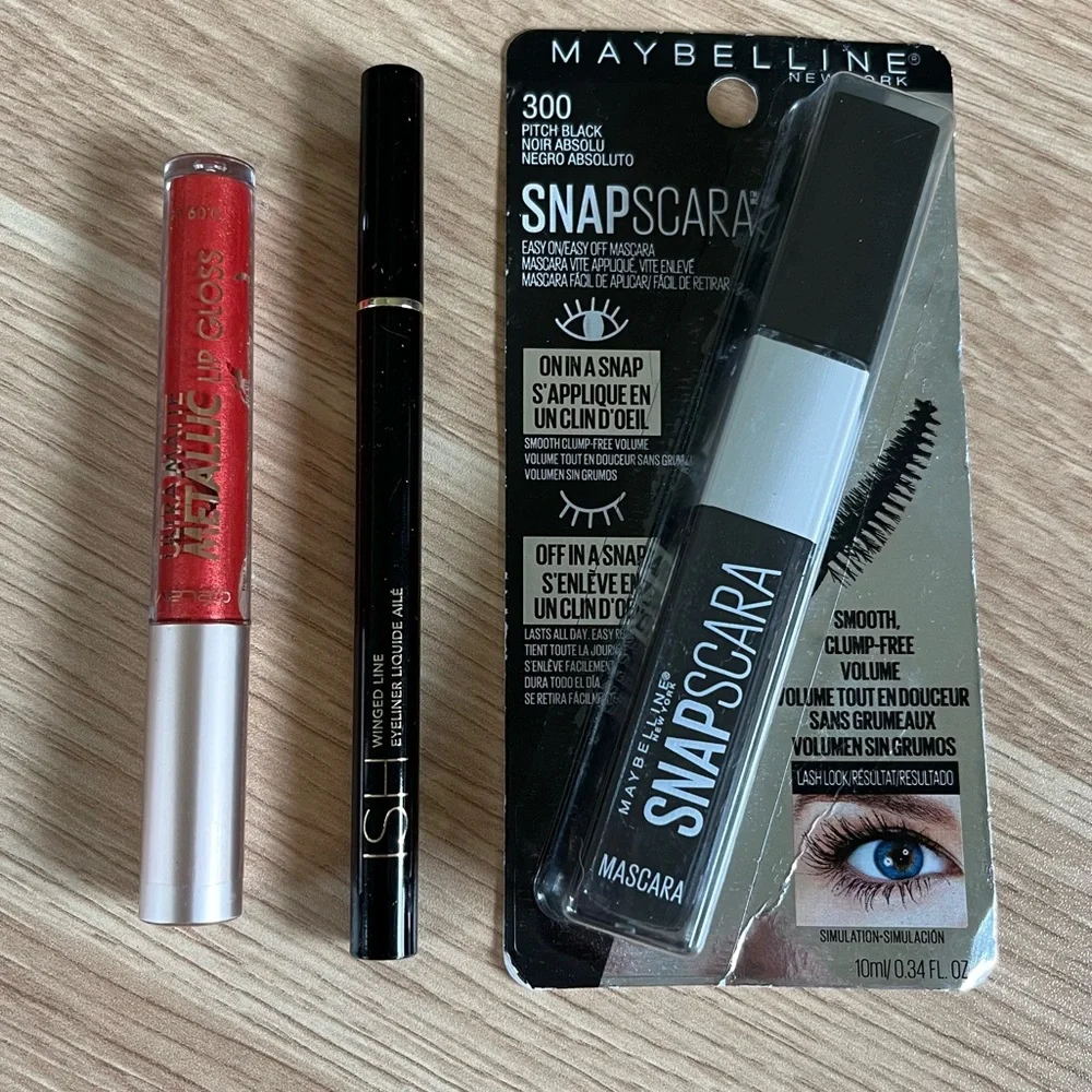 3 Items - Metallic Red Lip Gloss, Maybelline Mascara, and ISH Winged Liner
